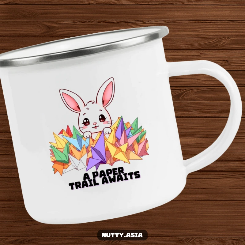 Funny camping mug showing a cute bunny peeking from colorful origami cranes, ideal for outdoor adventures and warm drinks.